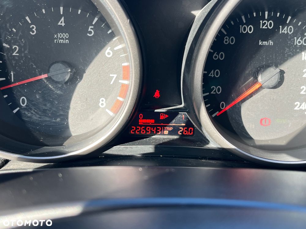 Mazda 3 1.6 Exclusive + - 9