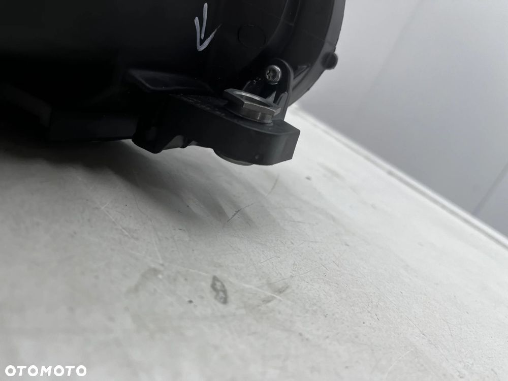 Lampa reflektor VW Tiguan 1 I 5n LIFT 10-16r. lewa przednia XENON EU skrętna doświetlanie zakrętów + - 16