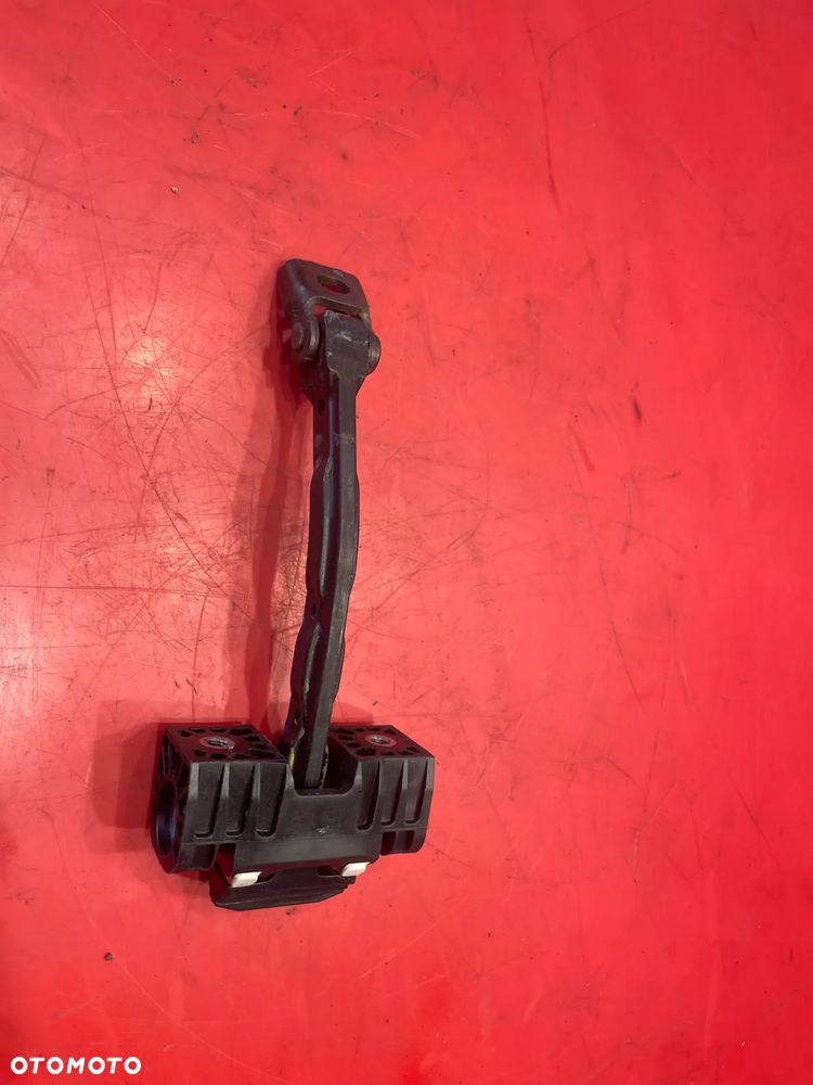 OGRANICZNIK LEWY PRZÓD SKODA  SUPERB 2 - 3