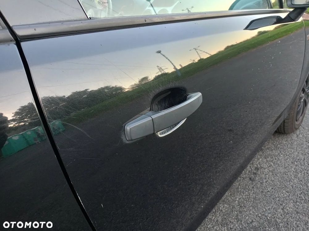 Opel Corsa 1.2 16V Enjoy - 18