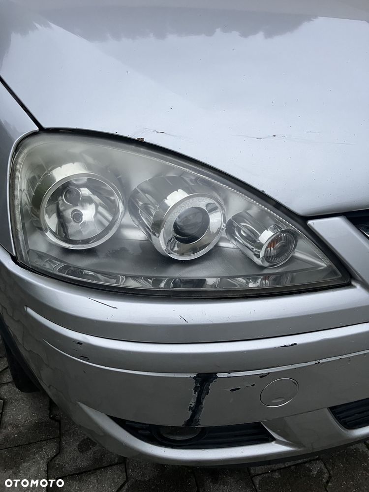 Opel Corsa 1.2 16V Cosmo - 8