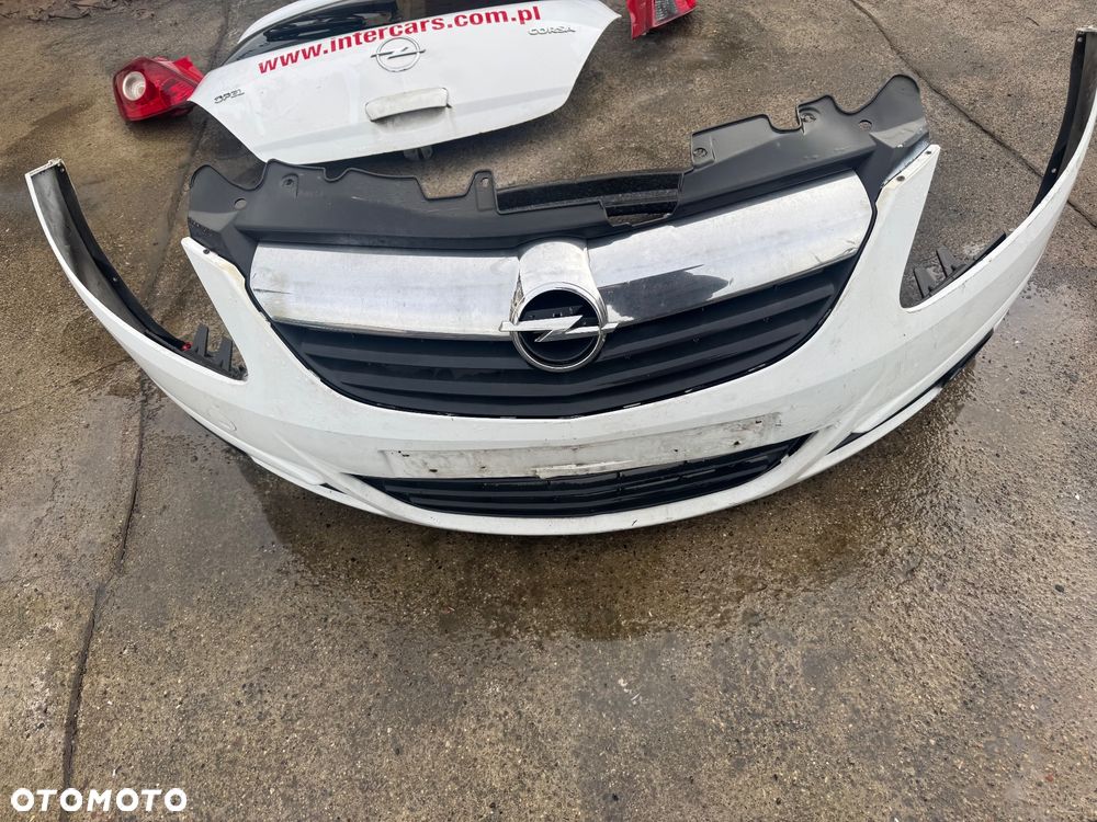 Opel Corsa D biała maska drzwi prawe lewe przednie przód pas przedni chłodnice wody klimy lampy lampa przednia prawa lewa błotnik prawy lewy biały białe zderzak przód przedni klapa bagażnika klapa tył tylnia lampa prawa lewa belka pod zderzak - 8