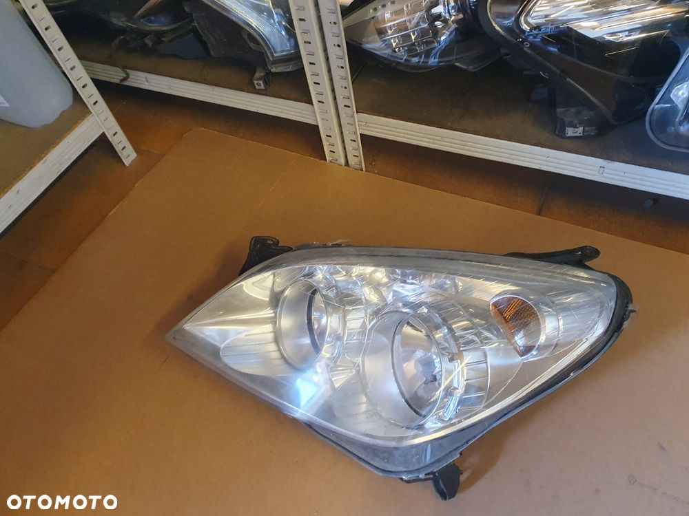 REFLEKTOR LEWY OPEL ASTRA H III LIFT EUROPA - 2