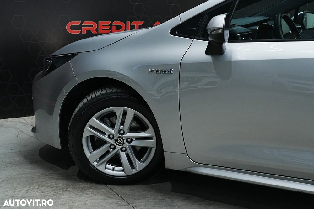 Toyota Corolla 1.8 HSD Business - 35