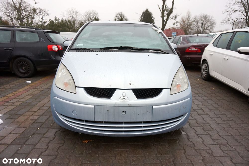 MASKA ZDERZAK BŁOTNIKI LAMPY COLT VI Z30 T42  MITSUBISHI 2004-2008 SREBRNY PRZÓD KOMPLETNY - 1