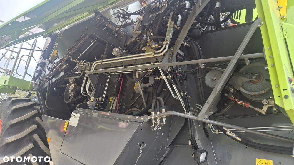 Claas Lexion 750 z hederem - 10
