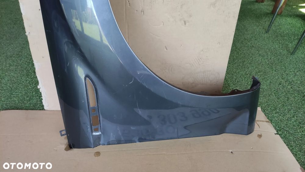Błotnik prawy Ford Mondeo MK4 - 12