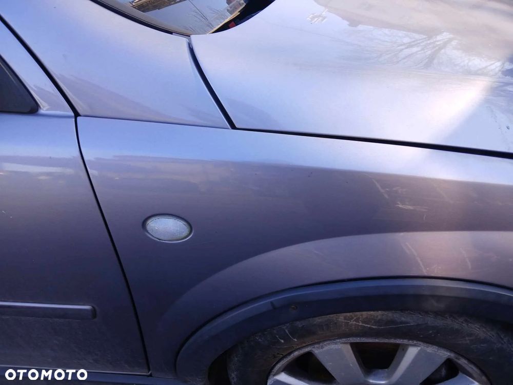 Opel Corsa C Błotnik prawy,  kod lakieru Z166 - 3