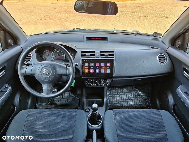 Suzuki Swift 1.3 Comfort+ - 11