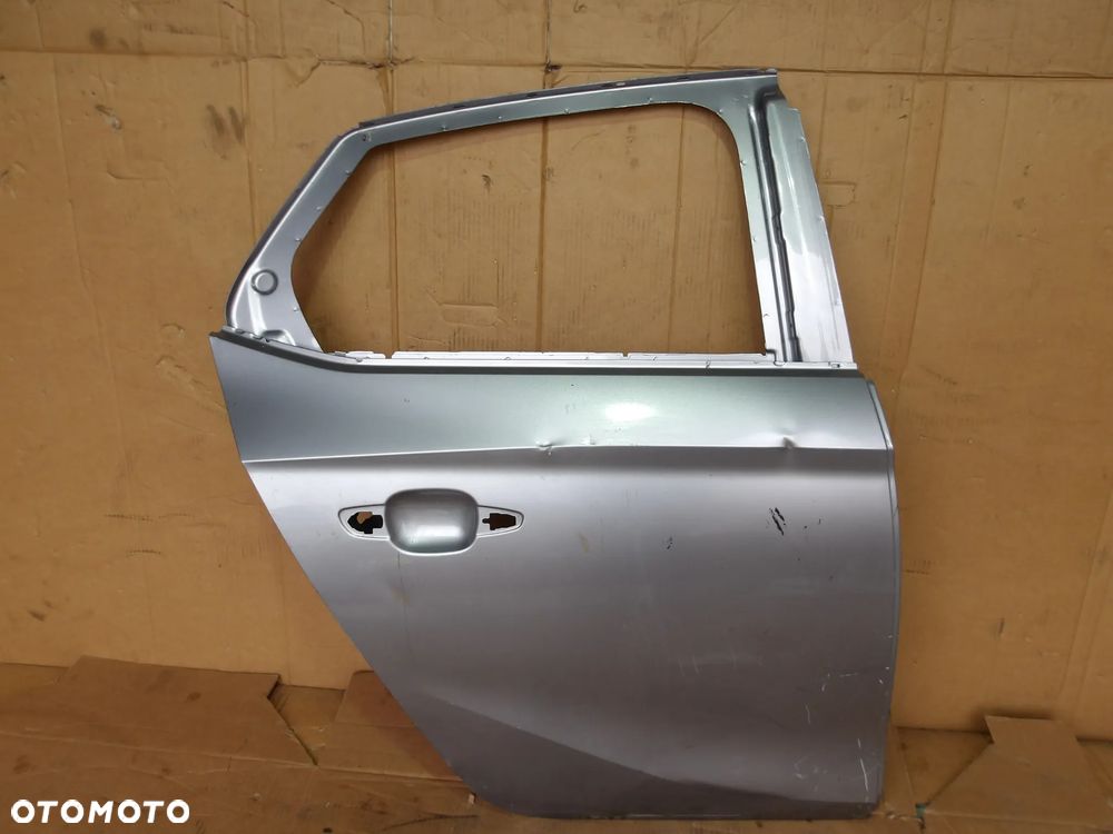 DRZWI PRAWY TYL OPEL CORSA F