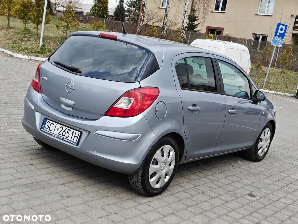 Opel Corsa 1.2 16V Cosmo - 11