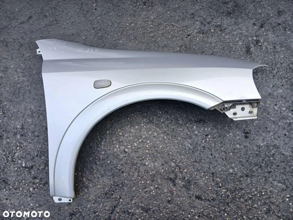 Opel Astra II G  Błotnik prawy kod lakieru Z147 - 1