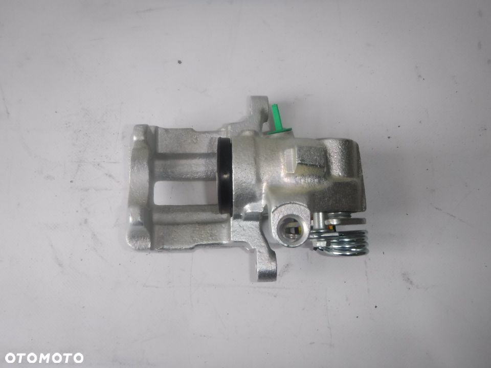 peugeot 405 zacisk hamulca hamulcowy lewy tył tylny corrado passat ibiza scirocco ibiza golf 3 - 3