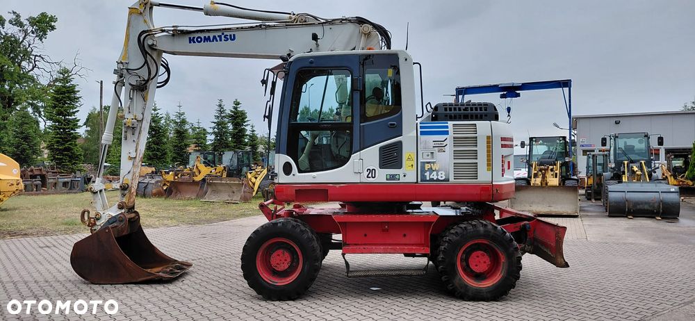 Komatsu 148 (2012r) 160 PW 140 - 12