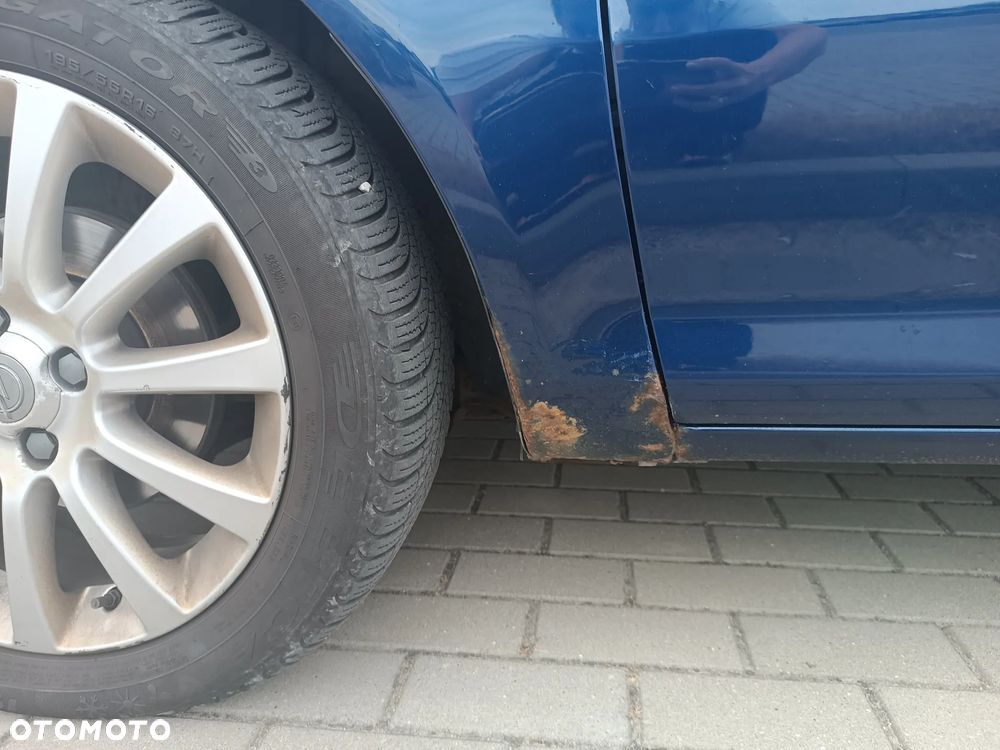 Opel Corsa 1.4 16V Cosmo - 21
