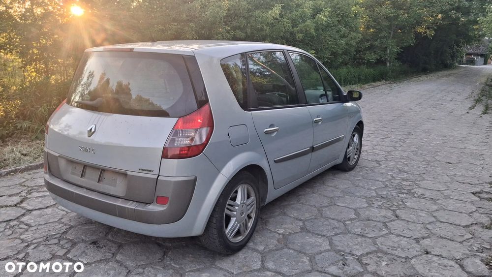 Na części Renault Scenic II silnik 1.6 16v K4M782 lakier MV632 skrzynia maska zderzak drzwi klapa szyba fotel kanapa lusterko lampa deska GWARANCJA !!! Przód Tył Zestaw Komplet Drzwi Klapa Zderzak Błotnik Maska Grill Atrapa Szyba Pas Lampa Lusterko Boczki Fotel Kanapa Kokpit Deska Rozdzielcza Przełącznik Włącznik Sterownik Przewody Wiązka Instalacja Moduł Komputer Czujnik Listwa Pompa Alternator Wtryski Głowica Rozrusznik Kompresor Sprzęgło Dwumas Silnik  Skrzynia ABS Klimatyzacji Paliwa Wspomagania Kolektor Turbina Przepustnica Zawór Chłodnica Koło Hak Belka Sanki Zawieszenie Mcpherson Półoś Amortyzator Wydech Tłumik Zacisk - 4