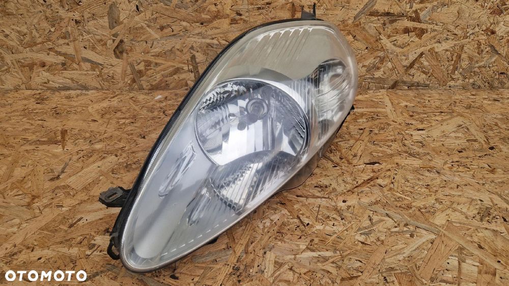 FIAT GRANDE PUNTO LAMPA LEWA PRZEDNIA PRZÓD EU VALEO - 1