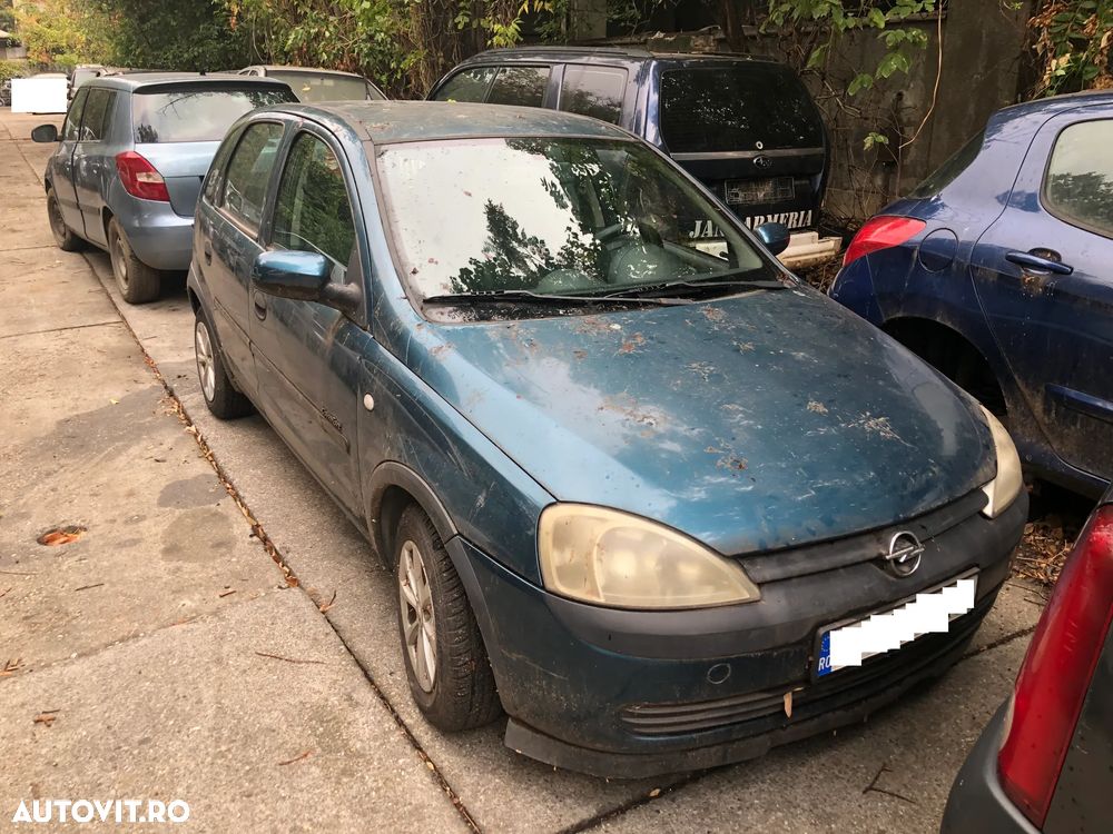 Dezmembrez Opel Corsa C 1.2 benzina 2002 4 usi albastru - 1
