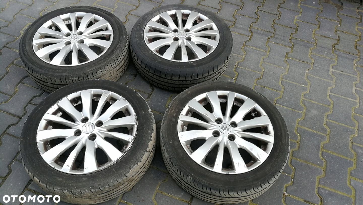 Felgi aluminiowe alufelgi 16 z oponami 4x100 Suzuki Swift MK7 10-16 - 1