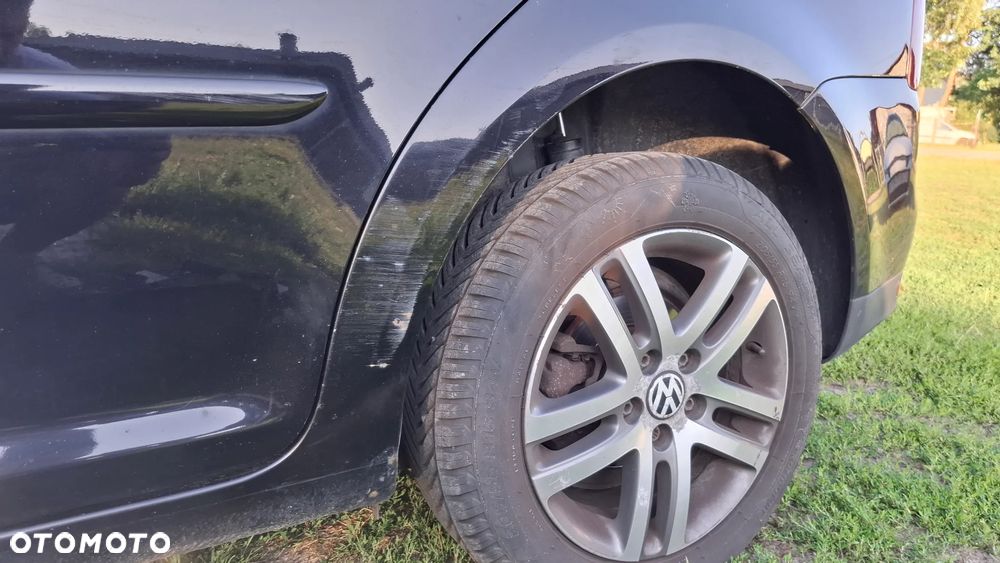 Volkswagen Touran 1.9 TDI Highline - 12