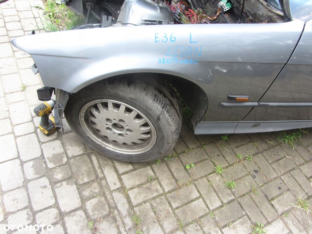 błotnik lewy przód bmw e36 sedan - 1