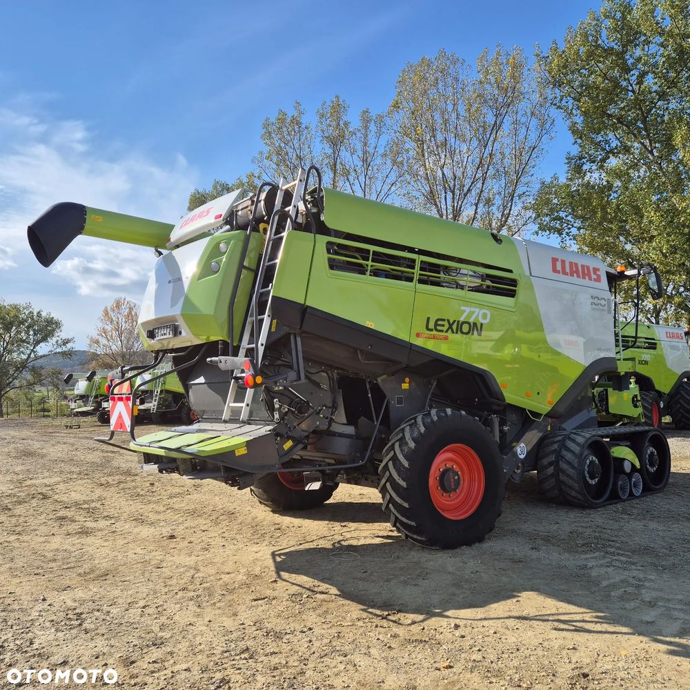Claas Lexion 770TT z hederem - 35