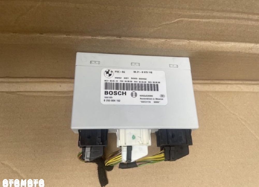 6973116 moduł sterownik parkowania pdc bmw 3 e90 e91 e81 e82 e87e84 - 1