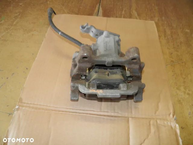 ZACISK HAMULCOWY VW AUDI SKODA BOSCH - 9