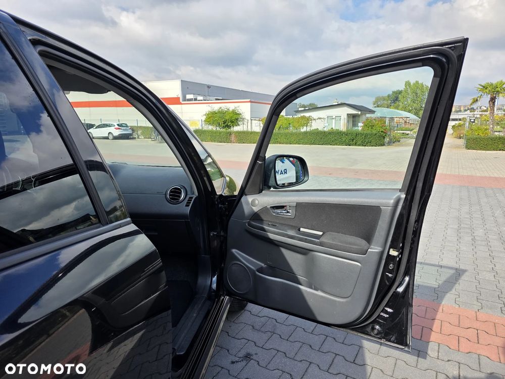 Suzuki SX4 1.6 Comfort Plus - 14
