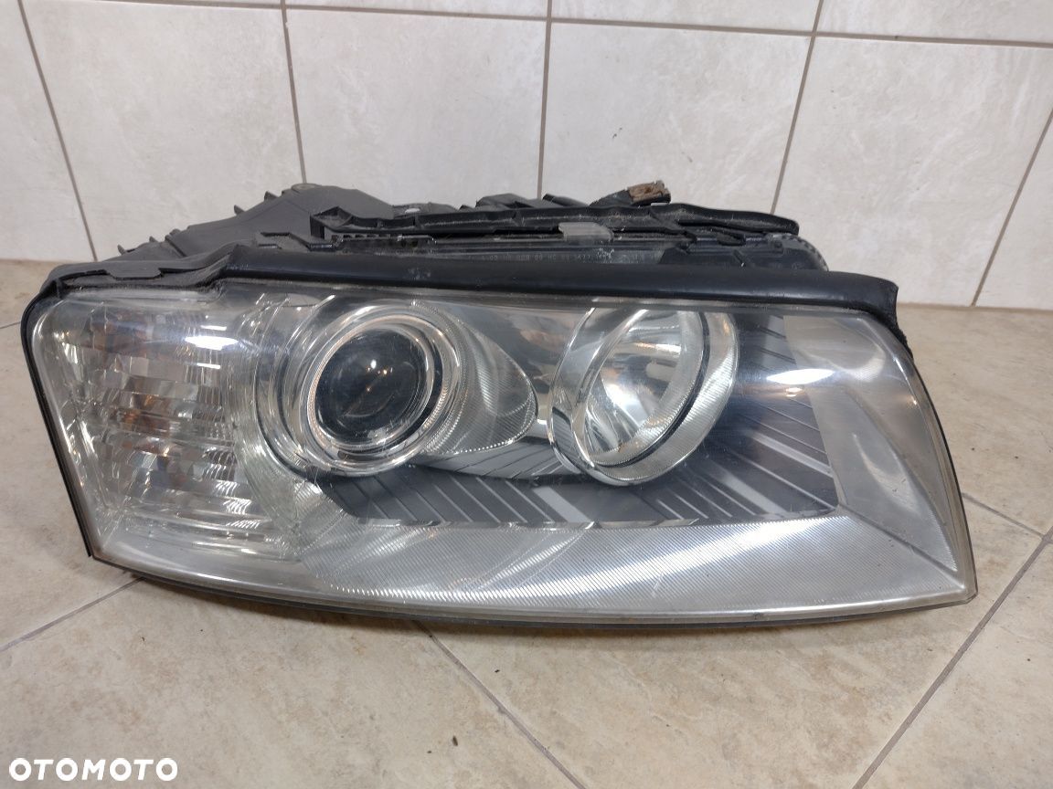 Reflektor lampa Audi A6 C6 04-08h1 H7 prawy przód oryginał zwykła - 1