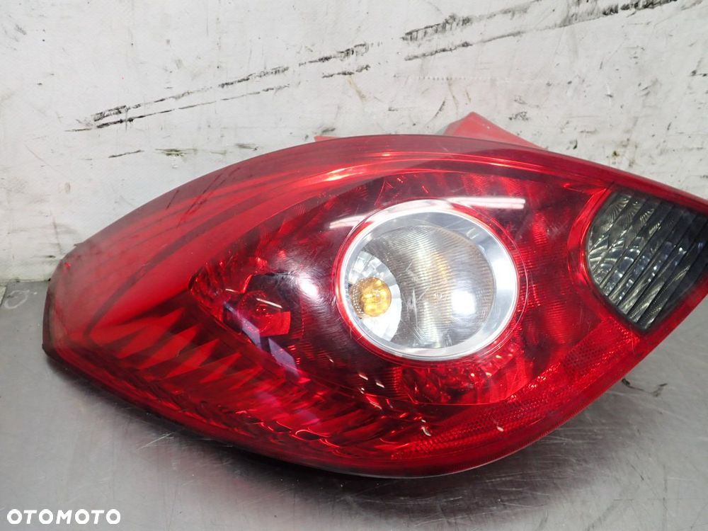 LAMPA LEWA TYLNA OPEL CORSA D 1.3CDTI 13211840 - 3