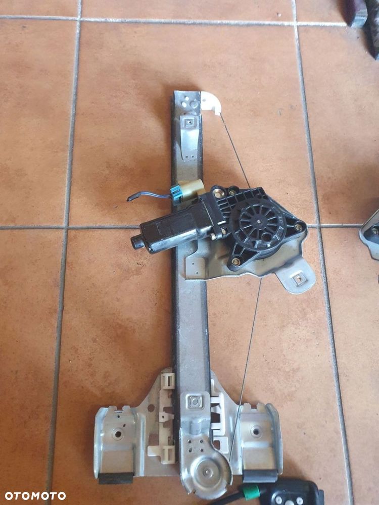 PODNOŚNIK SZYBY PRZÓD TYŁ L/P HUMMER H3 - 2