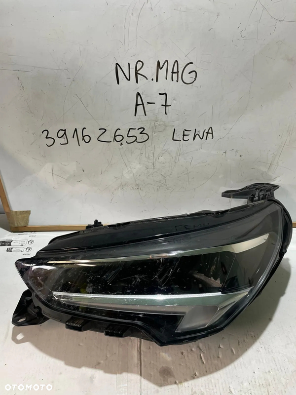 LAMPA LEWA PRZÓD OPEL CORSA F 39162653