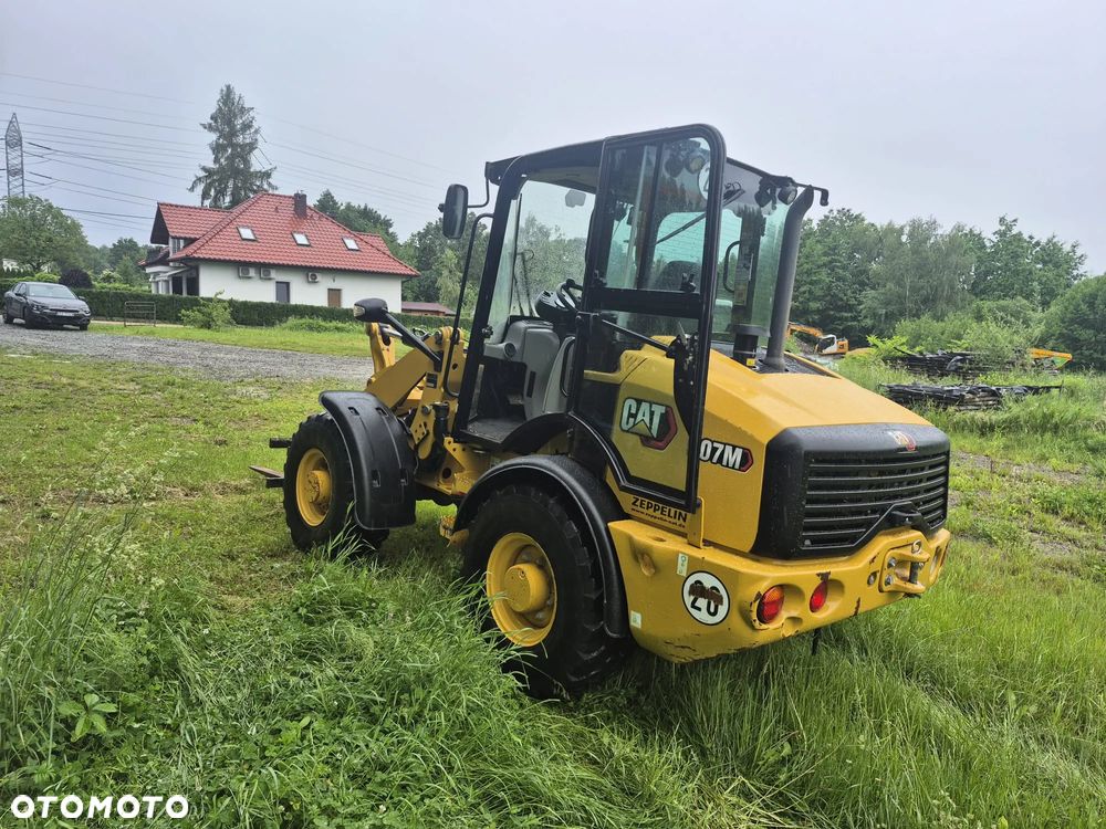 Caterpillar 907 - 10