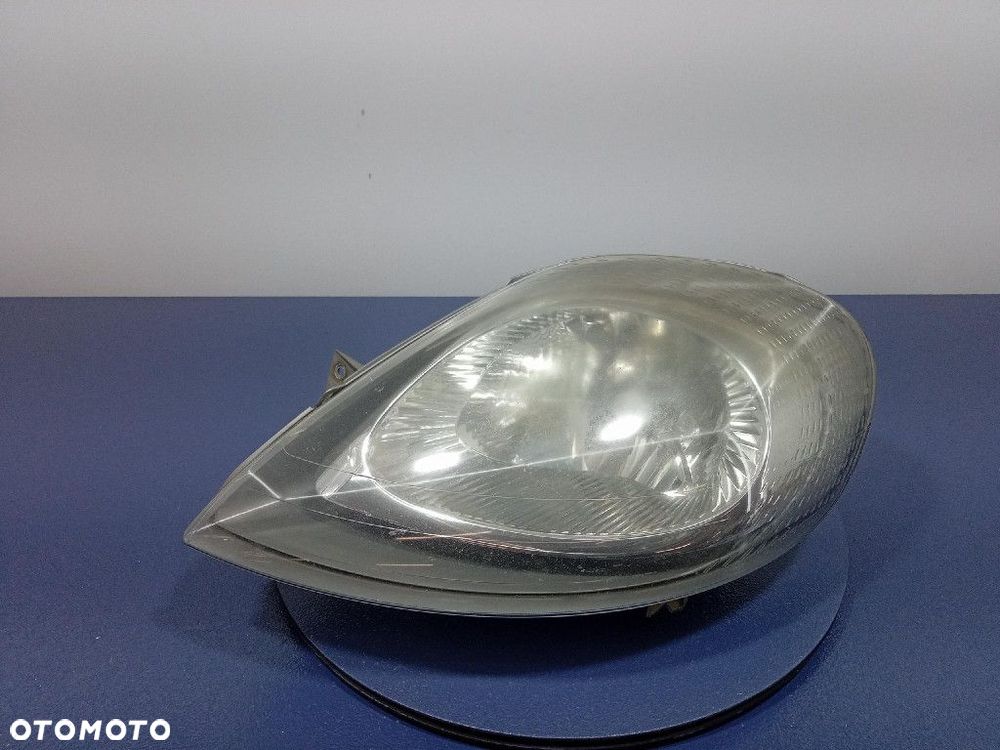 OPEL VIVARO A TRAFIC II REFLEKTOR LEWY PRZÓD LAMPA PRZEDNIA EU 7700311371 - 1