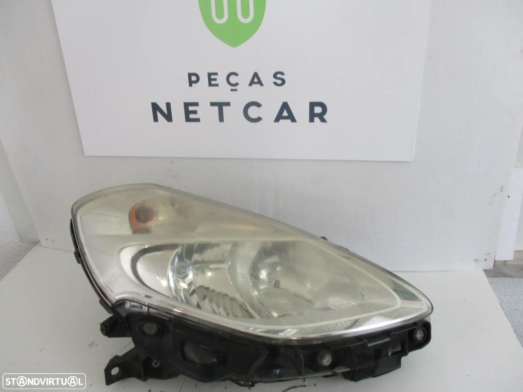 Farol optica direito Renault clio III 3 2010 - 1