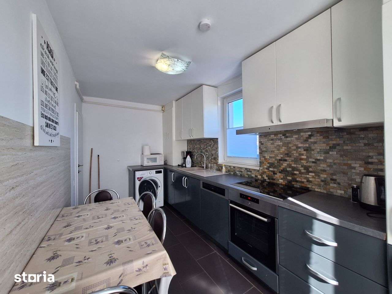 Apartament cu 3 camere, 60 mp, balcon de 20 mp, zona BMW — fotografia 2