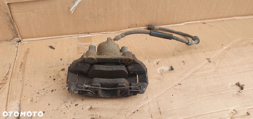 Zacisk hamulcowy prawy przód przedni prawy Skoda Rapid - 5