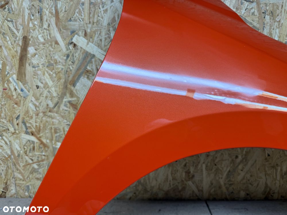 BŁOTNIK PRZÓD PRAWY PRZEDNI PRAWY OPEL CORSA F POMARAŃCZOWY - 24