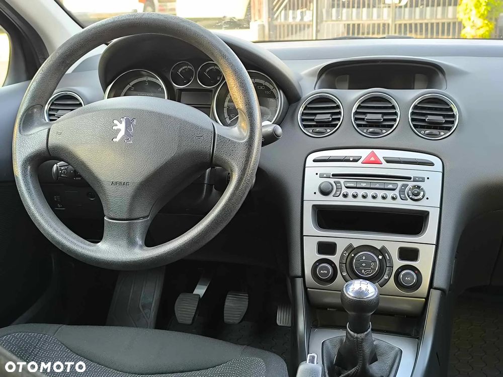 Peugeot 308 1.6 HDi Premium - 14