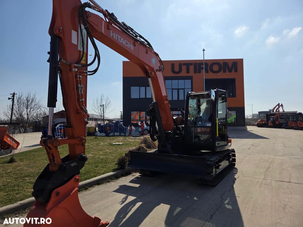 Hitachi ZX85, 2022, 2.491h, 8,6t, CUPLA RAPIDA HIDRAULICA+3 CUPE NOI, LAMA NIVELARE, ad sapare 5m, inst picon, instalatia rotire atasament, senile cauciuc, AC, Camera spate, ridica 4,5t, latime 2,2m, CA NOU, posibilitate leasing 4 ani-PROMOTIE 62.900 EUR+Tva - 5