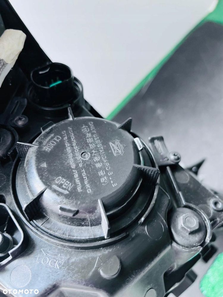 LAMPA LEWA REFLERTOR LEWY HYUNDAI TUCSON FACE LIFT ZWYKŁA HALOHENOWA H7 - 12