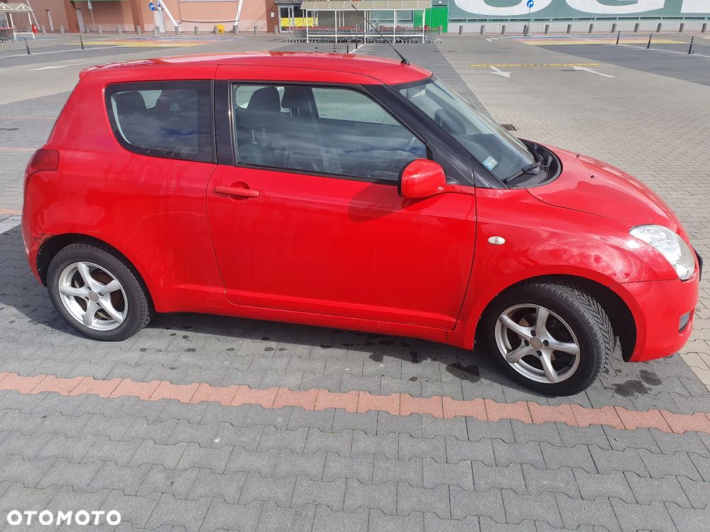 Suzuki Swift 1.3 Club - 7