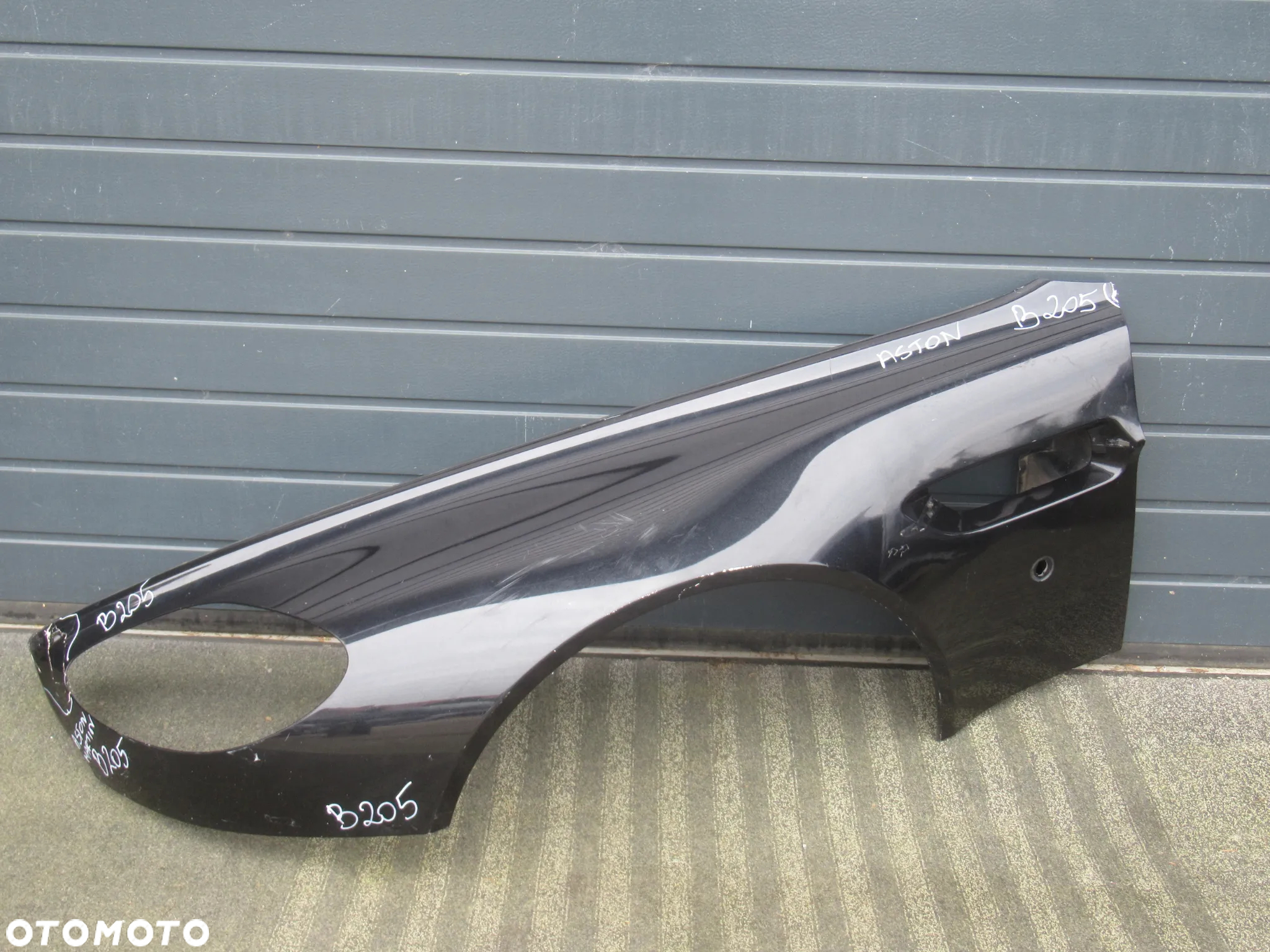 BŁOTNIK PRZEDNI PRZÓD PRAWY LEWY ASTON MARTIN VANTAGE V8 2005 - 2