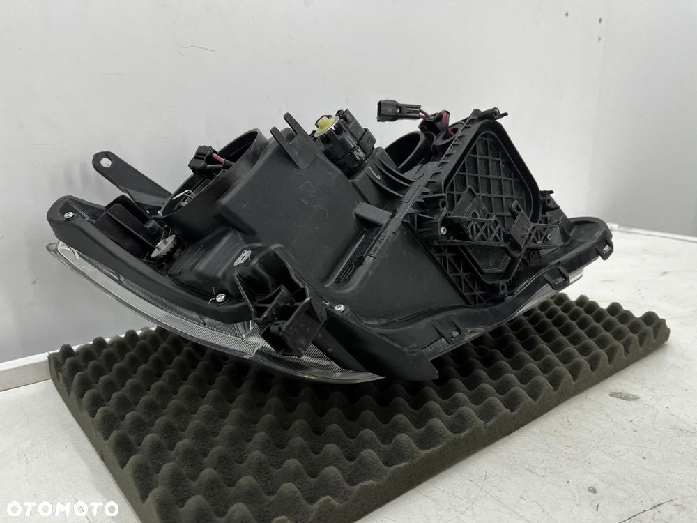 Lampa reflektor Toyota Avensis 2 II T25 LIFT 06-09r. lewa przednia EU H7 soczewka lewy przód 81170-0 - 17
