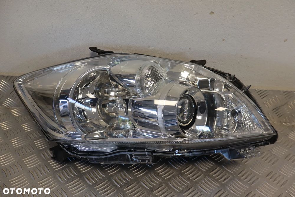 LAMPA PRZEDNIA PRZÓD PRAWA TOYOTA AURIS I LIFT SOCZEWKA 81130-02A40 2009-2012 - 6