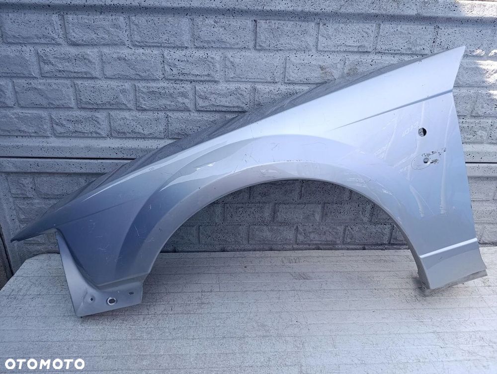 FORD MUSTANG IV LIFT 1999-04 BŁOTNIK LEWY ORYGINAŁ