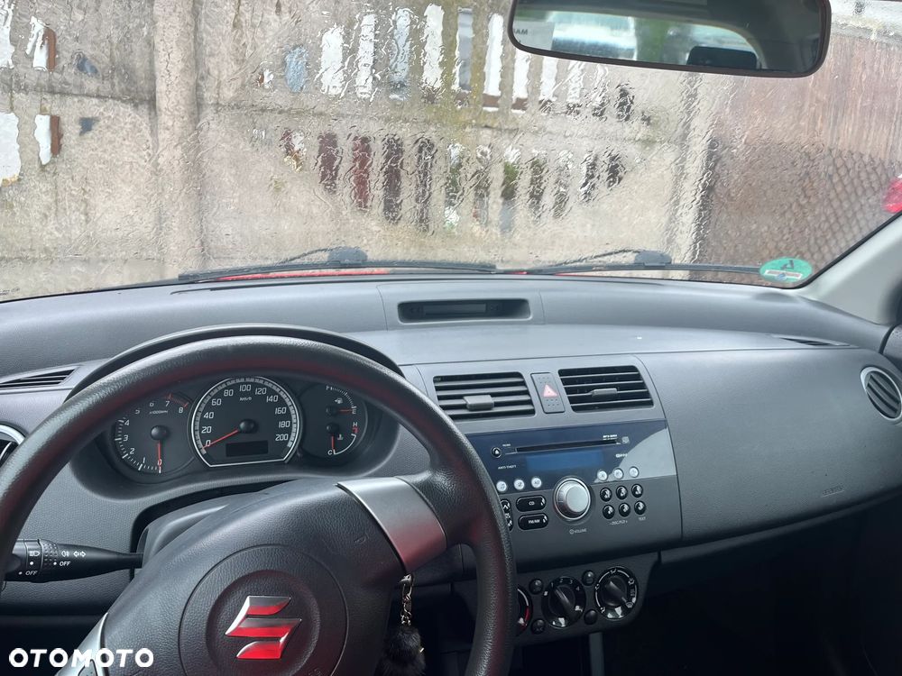 Suzuki Swift 1.3 Club - 9