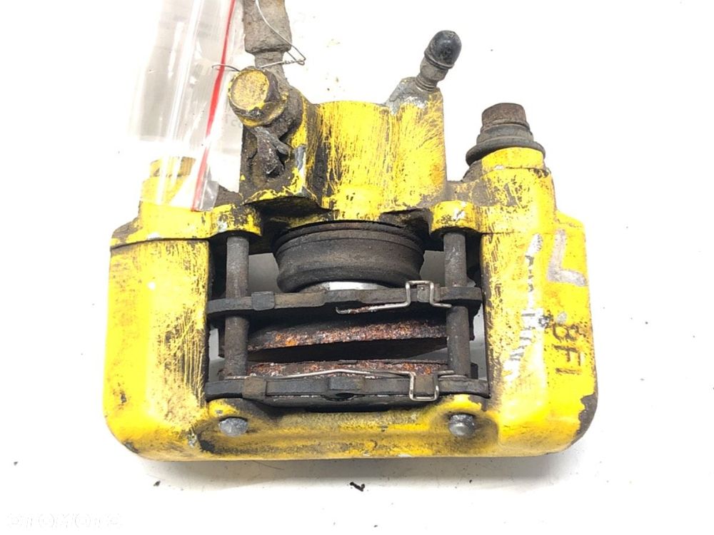 ZACISK LEWY TYŁ - 117.00 PLN - TOYOTA CELICA coupe (_T23_) 1999 - 2006 1.8 16V VT-i (ZZT230_) 105 - 1