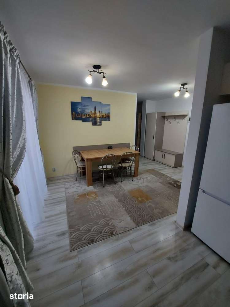 Apartament cu 3 camere,etaj intermediar,parcare subterana,zona Eroilo — fotografia 1